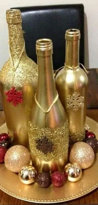 Elegant gold bottles with festive ornaments on a wooden table.