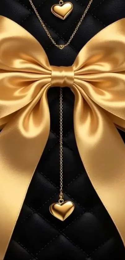 Elegant gold bow with heart pendants on a black background.