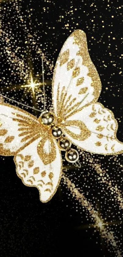 Golden butterfly with glitter on black background.