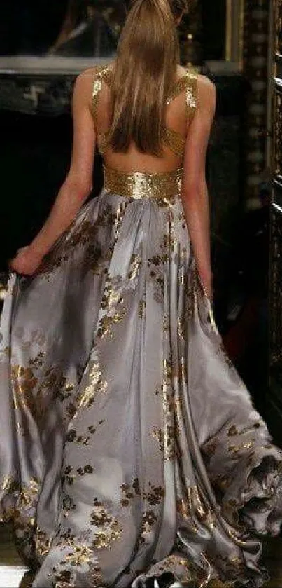 Elegant gold evening gown with intricate designs in a luxurious setting.