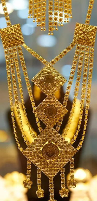 Close-up of intricate gold jewelry with geometric patterns.