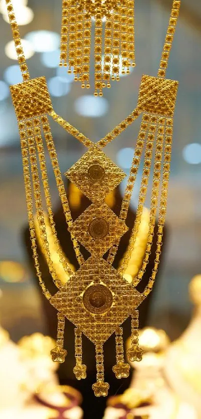 Elegant gold jewelry with intricate design, featuring glimmering chains and gems.