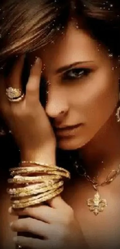 Woman adorned with gold jewelry, elegantly posed.