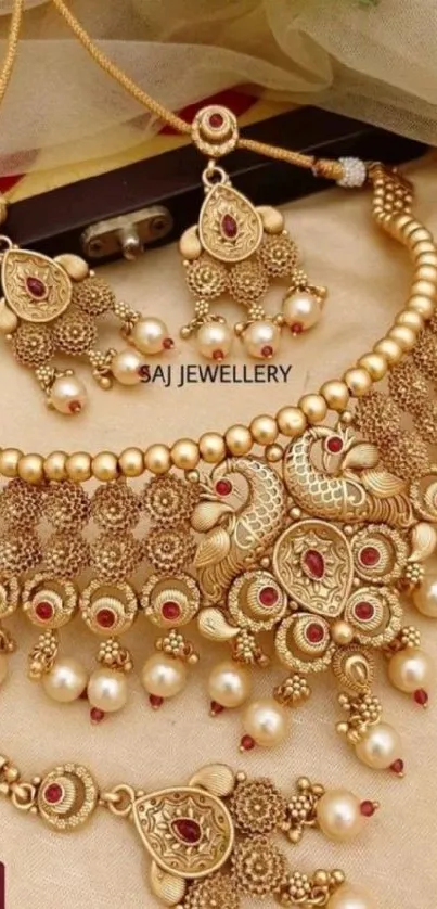 Elegant gold jewelry with intricate design and pearls, perfect for a luxurious wallpaper.