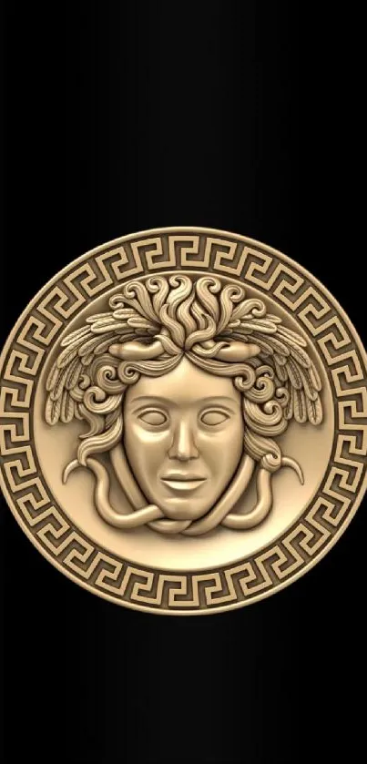 Gold Medusa emblem on black background wallpaper for mobile.