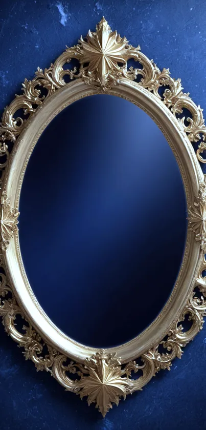 Vintage gold ornate mirror on blue background.