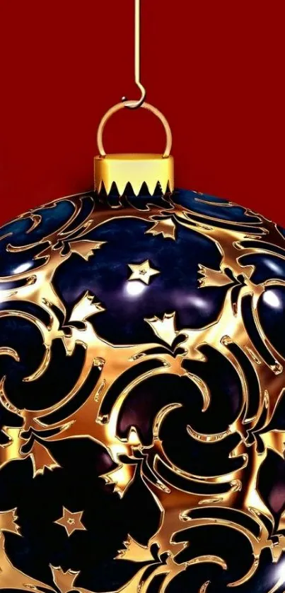 Golden ornament with intricate patterns on red background.