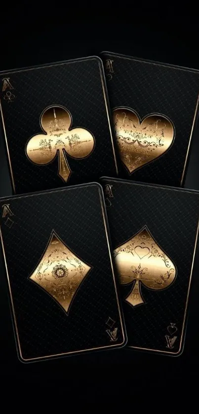 Elegant gold playing cards on black background.