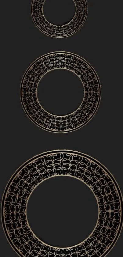 Elegant gold rings on a black background mobile wallpaper.