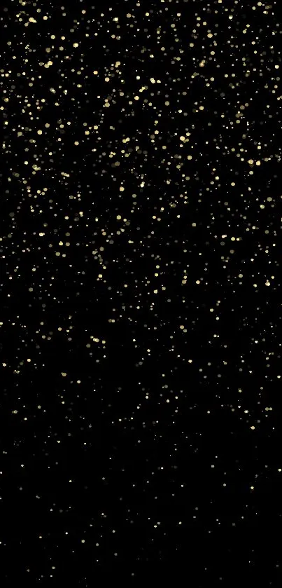 Elegant gold sparkles on a black background, perfect for mobile wallpaper.