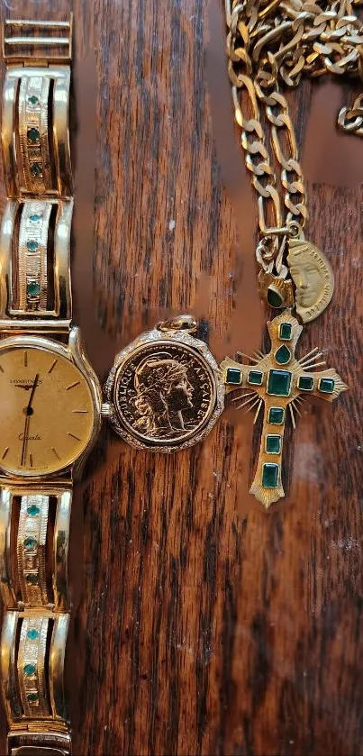 Gold watch and vintage jewelry on a wooden background.