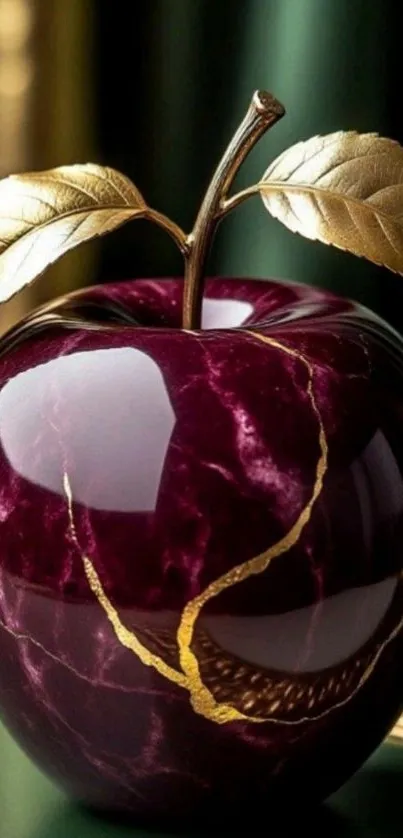 Luxurious red apple with golden leaves on green background.
