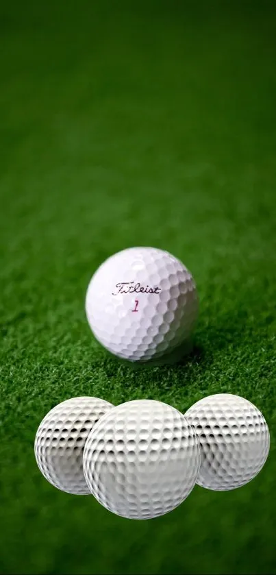 Golf balls on green grass wallpaper for mobile.