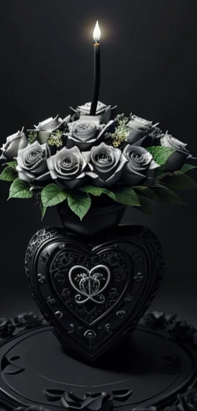 Gothic heart vase with black roses and a candle.