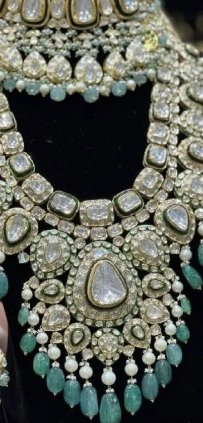 Luxurious green gemstone jewelry wallpaper with intricate design.