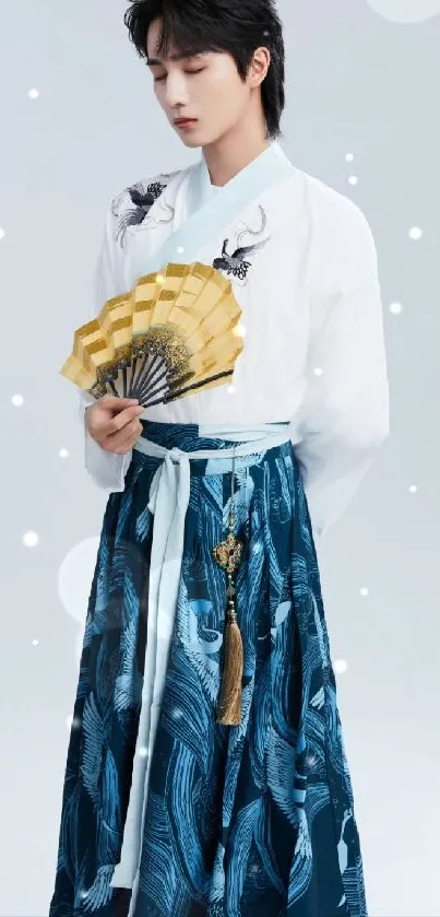 Person in a traditional Hanbok holding a fan.