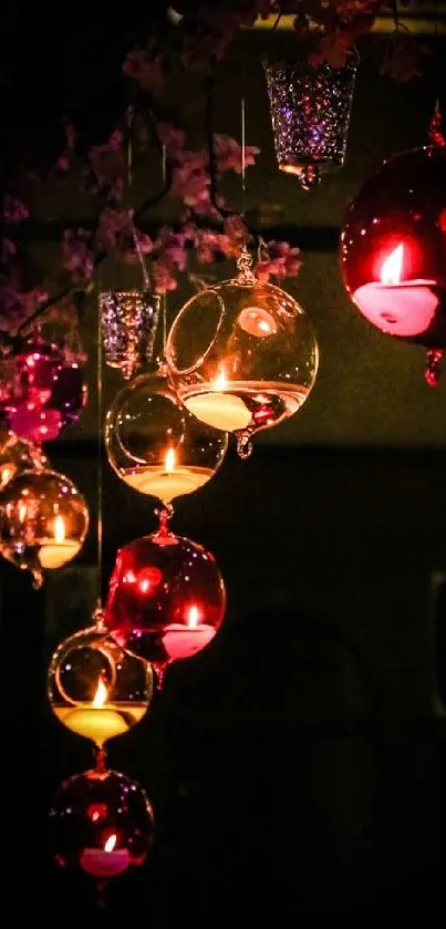 Elegant hanging glass lanterns with warm glow on a dark background.