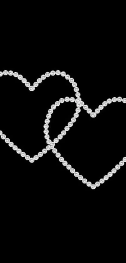 Pearl chain hearts on black background wallpaper.