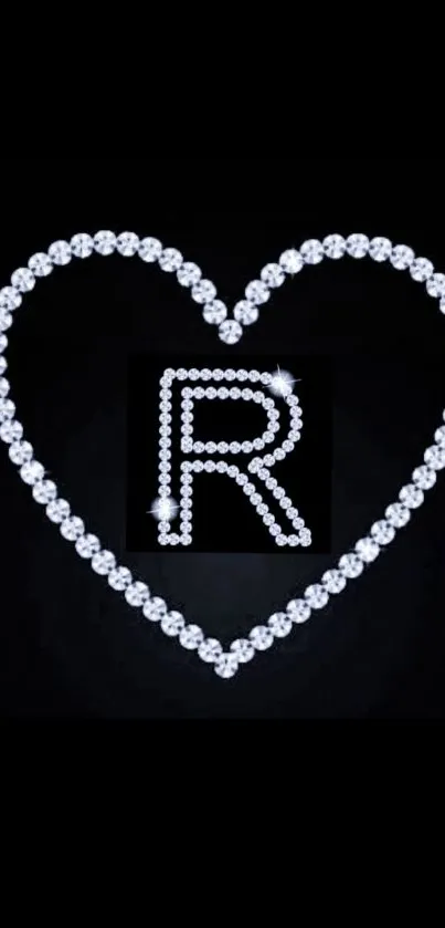 Heart-shaped diamond pattern with letter R on black background.