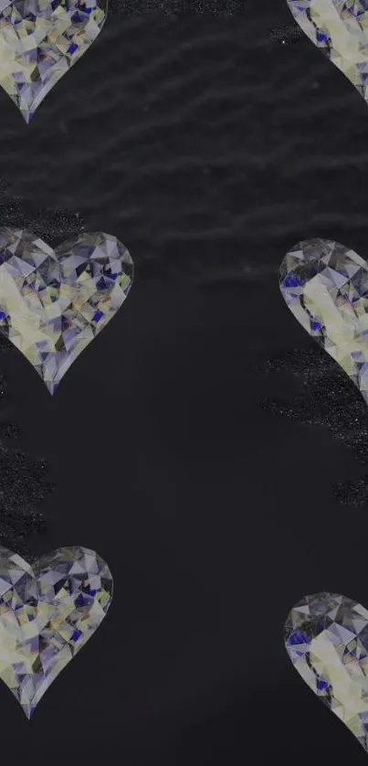 Heart-shaped gemstones on black wallpaper.