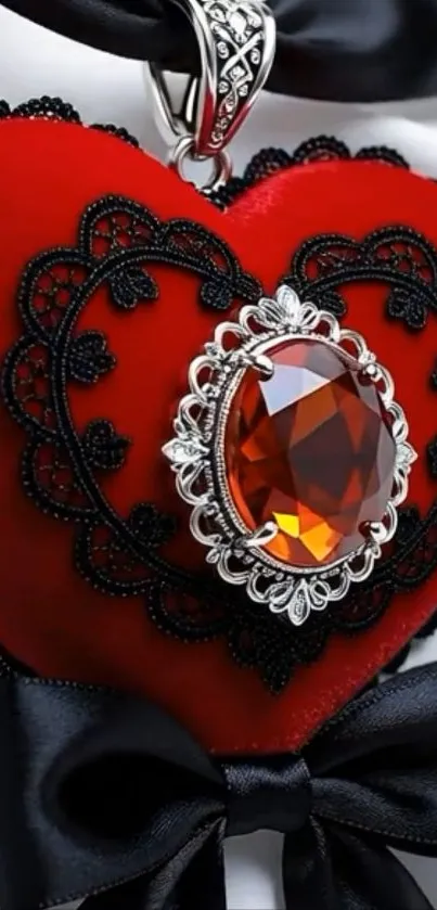 Heart-shaped jewel with black lace and red background.