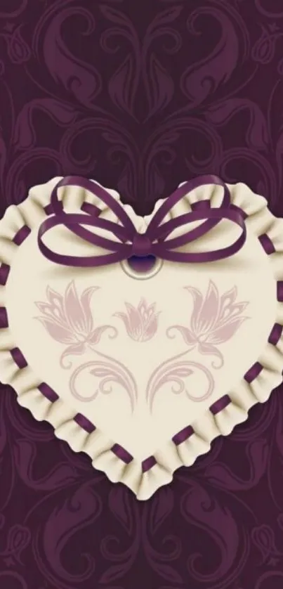 Elegant heart pattern with floral design on dark purple background.