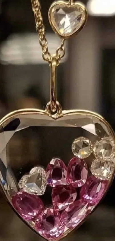 Elegant heart-shaped pendant with crystals and pink gems.