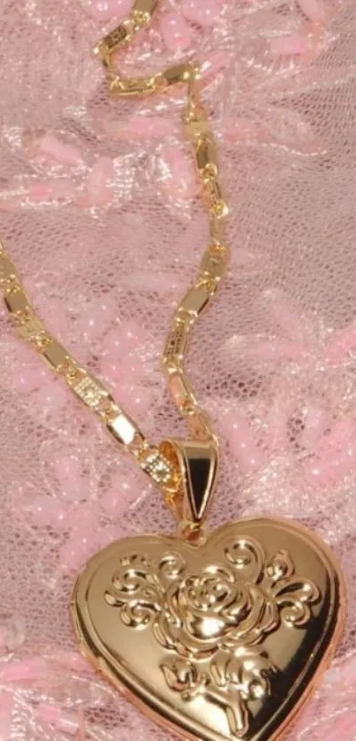 Luxurious gold heart pendant on pink lace.