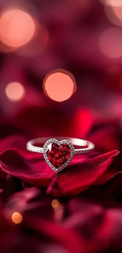 Heart-shaped ring on red petals, bokeh effect.