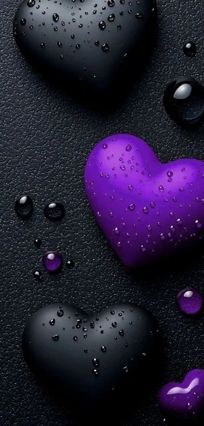 Glossy black and purple heart shapes with water droplets on textured background.