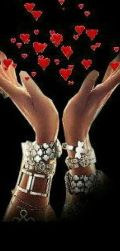 Wallpaper featuring hands with jewelry raising red hearts against a black backdrop.