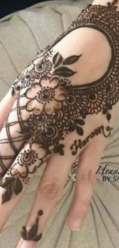 Intricate henna design on hand, perfect smartphone wallpaper.