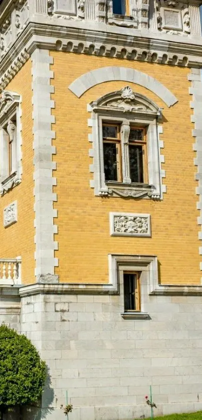 Elegant historic building with yellow facade.