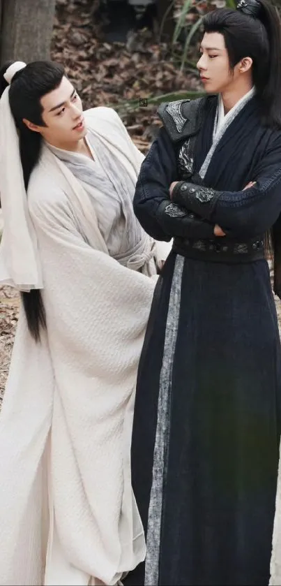Elegant historical duo in traditional garments, perfect for mobile wallpaper.