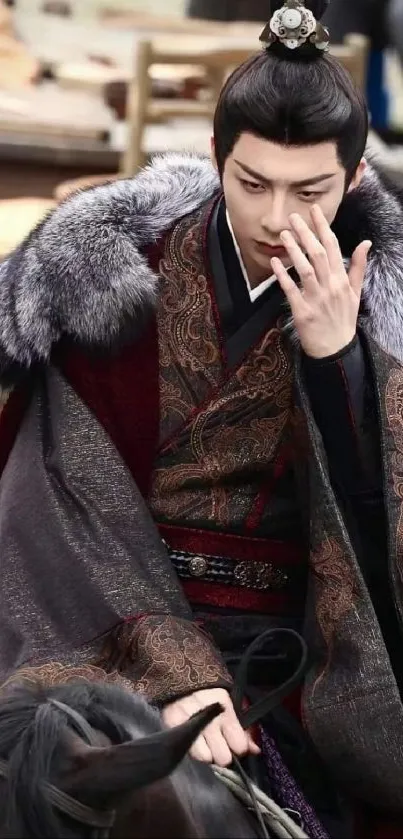 Elegant warrior in traditional attire with dark red and gray cloak.