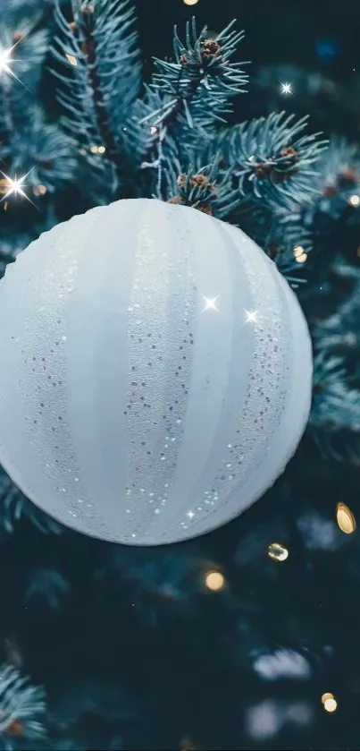 White ornament on Christmas tree with sparkling lights.