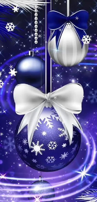 Elegant blue and silver holiday ornaments with bows and sparkling snowflakes.