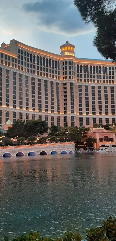 Stunning hotel by the water at sunset.