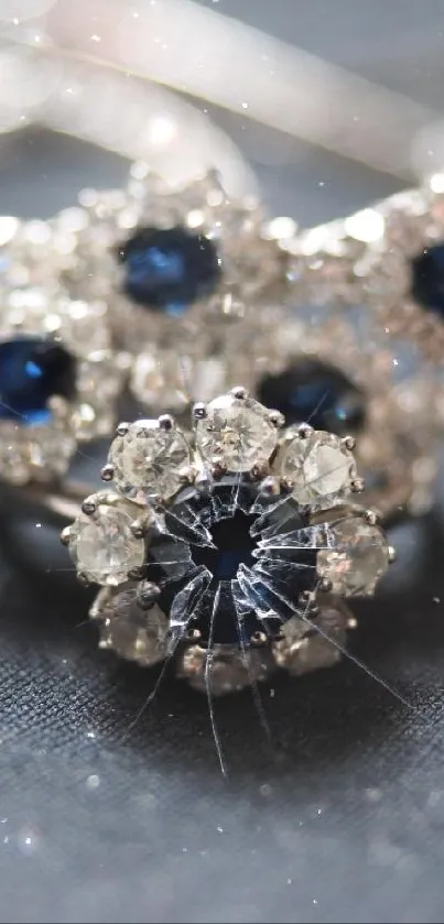 Close-up of elegant gemstone jewelry with blue and white stones.
