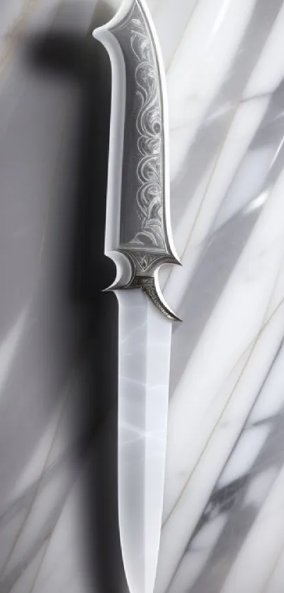 Elegant knife on a marble background, perfect for mobile wallpaper.