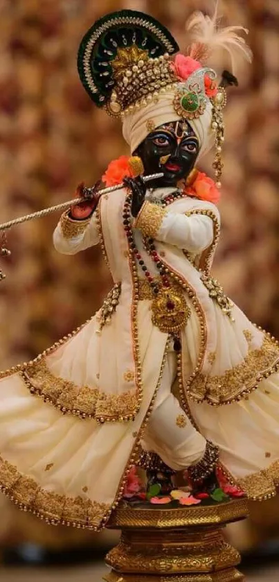 Elegant Krishna statue in detailed attire as a mobile wallpaper.