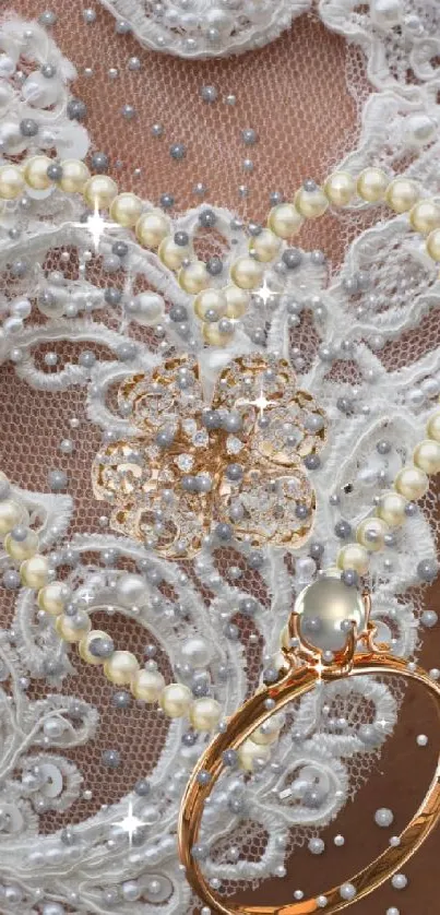 Elegant lace and pearl design with gold ring on wallpaper.