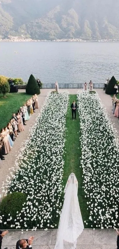 Elegant wedding aisle with scenic lakeside view and mountain backdrop.