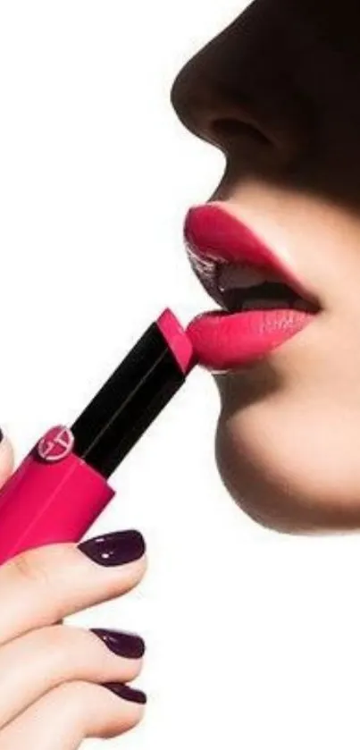 Close-up of pink lipstick against a soft skin backdrop.