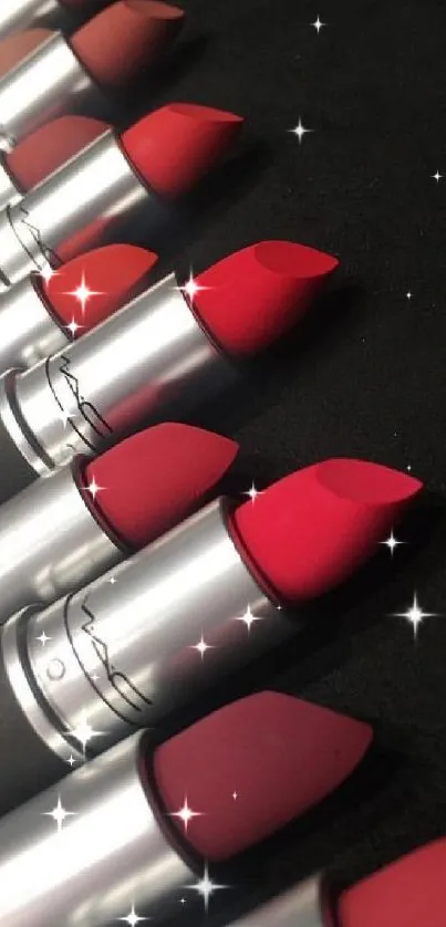 Vibrant lipsticks arranged in a row on a sleek black background.