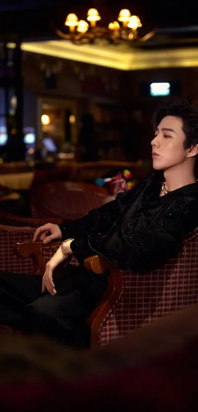 Man in a dark elegant lounge setting, relaxed atmosphere.
