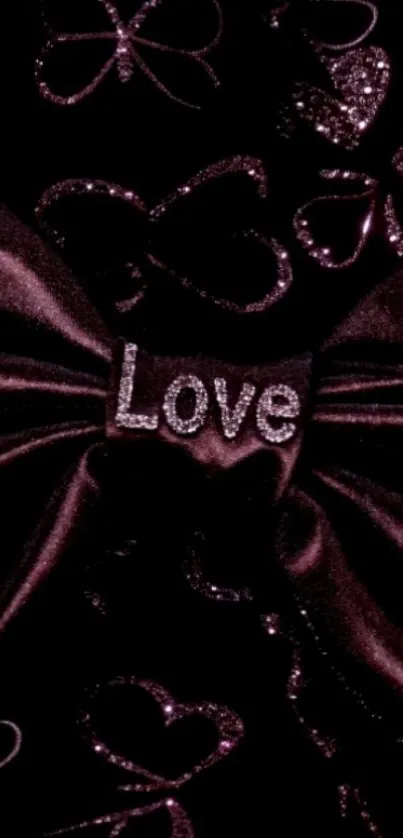 A luxurious purple bow with the word Love on a sparkling heart background.
