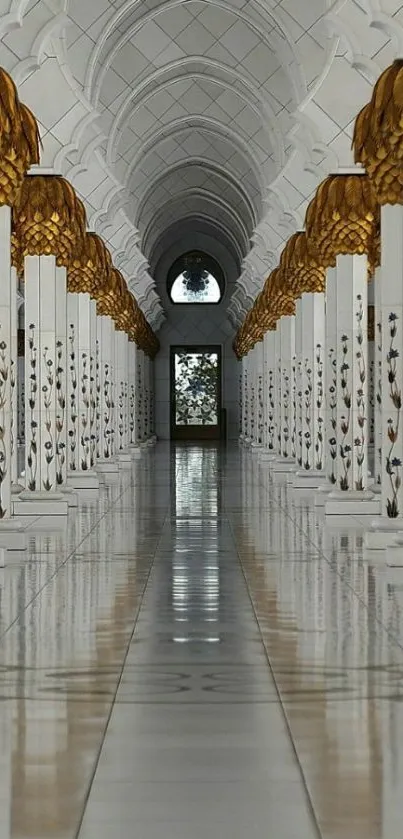 Elegant marble corridor with gold accents and symmetrical columns.