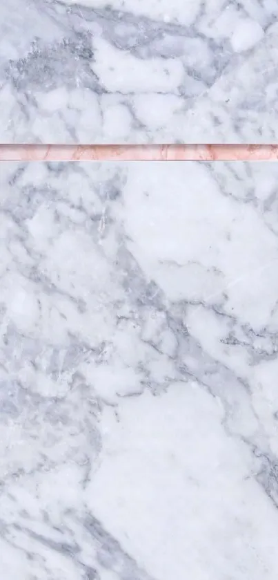 Light gray marble wallpaper with rose gold frame.