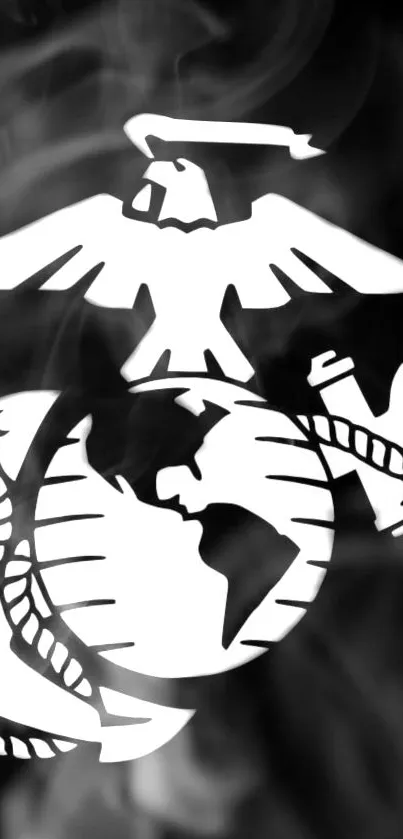 US Marine Corps emblem in black and white with smoke background.